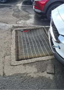 Tầm quan trọng của việc đảm bảo nắp đậy và lưới đạt tiêu chuẩn